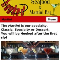 Photo taken at Hooked: Seafood &amp;amp; Martini Bar by John B. on 5/29/2013