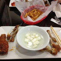 Photo taken at BonChon Chicken by Claire Y. on 6/8/2013
