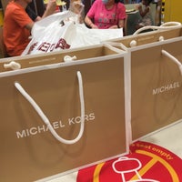 Photo taken at Michael Kors by Lily F. on 7/31/2020