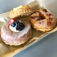 Photo taken at Glazed Gourmet Doughnuts by Chelsea P. on 8/16/2018