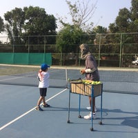 Photo taken at Tennis Court - Panya Village by Preechaya K. on 3/6/2014