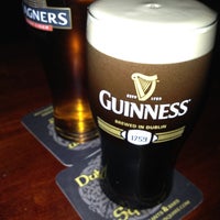 Photo taken at Dubh Linn Square Irish Pub by Phil J. on 4/14/2013