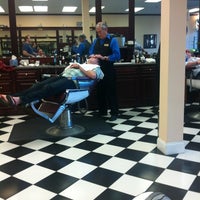 Photo taken at Gino&amp;#39;s Classic Barber Shoppe by Cooper G. on 2/25/2012