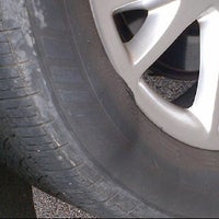 Photo taken at Discount Tire by John J. on 3/31/2012