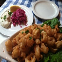 Photo taken at Kokoras Greek Grill by Katherine C. on 8/7/2012