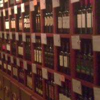 Photo taken at Vintropolis Wine Bar by Liz C. on 5/4/2012