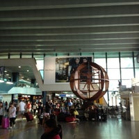 Photo taken at Gate C5 by JUNKO on 8/23/2012