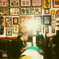 Photo taken at New Wind Tattoo by Sarah G. on 6/23/2012