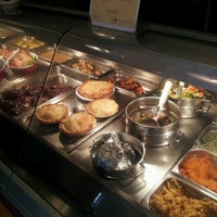 Photo taken at Chicken Out Rotisserie by Perla R. on 8/6/2012