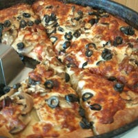 Photo taken at Pizza Hut by NÎLAY A. on 8/17/2012