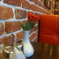 Photo taken at New York Street Pizza by Aftie B. on 6/22/2012