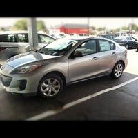 Photo taken at Roger Beasley Mazda Central by Megan S. on 7/3/2012