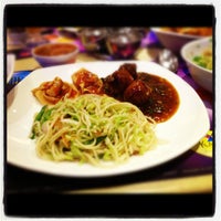 Photo taken at Kamat Vegetarian Restaurant by Shrish K. on 6/28/2012