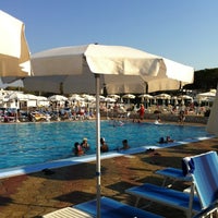 Photo taken at Coco Beach Club, Cozze - Polignano a mare by Di Tullio L. on 8/19/2012
