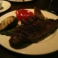 Photo taken at The Keg Steakhouse + Bar - Coquitlam by Sam L. on 5/16/2012