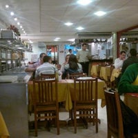 Photo taken at Pizza Grill Vencedor 101 by Cristiane M. on 7/16/2012