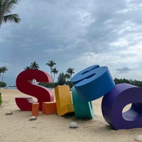 Photo taken at Siloso Beach by 6624 on 12/31/2023