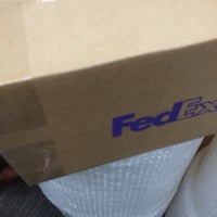 Photo taken at FedEx Office Print &amp;amp; Ship Center by SPLIF S. on 1/8/2014
