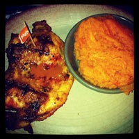 Photo taken at Nando&#39;s by Nadoone J. on 12/2/2012