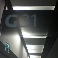 Photo taken at Gate G31 by Tünde V. on 10/9/2012