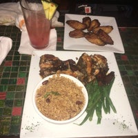 Photo taken at Reef Caribbean Restaurant And Lounge by LetsGoJames on 1/10/2016