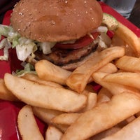 Photo taken at Red Robin Gourmet Burgers and Brews by Dianna M. on 3/28/2018