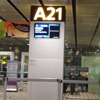 Photo taken at Gate A21 by Meepok C. on 3/27/2015