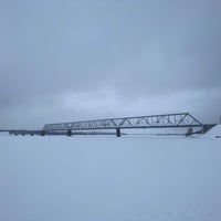Photo taken at ж/д мост через Волгу by Yulia 🐾 on 2/1/2022