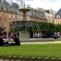 Photo taken at Place des Vosges by Adam S. on 6/2/2015