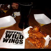 Photo taken at Buffalo Wild Wings by Marilina G. on 12/25/2014