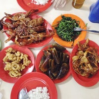 Photo taken at Seafood Angga by Eveline F. on 10/23/2014