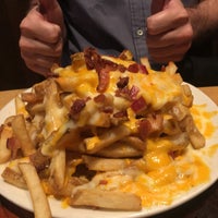 Photo taken at Outback Steakhouse by Isabelle C. on 12/19/2019