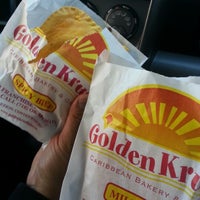 Photo taken at Golden Krust Caribbean Bakery and Grill by Ang J. on 9/25/2012