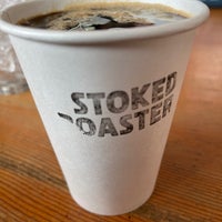 Photo taken at Stoked Roasters + Coffeehouse by Juan F. on 3/21/2022