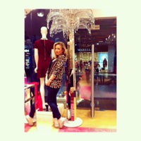 Photo taken at Juicy Couture by Madrina P. on 11/30/2013