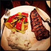Photo taken at The Keg Steakhouse + Bar - Arlington by Ryan S. on 12/2/2013