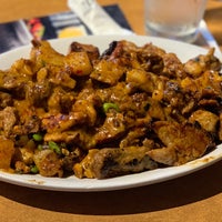 Photo taken at bd&amp;#39;s Mongolian Grill by Richard S. on 8/2/2019
