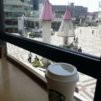 Photo taken at Starbucks Coffee 千里中央店 by MASAAKI N. on 4/19/2013