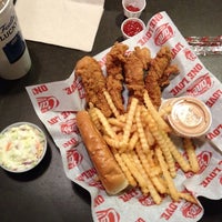 Photo taken at Raising Cane&amp;#39;s Chicken Fingers by Erin R. on 2/8/2014