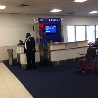 Photo taken at Gate A12 by Luis E. on 12/14/2015