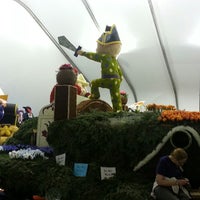 Photo taken at Rose Bowl Float Decorating by Libby L. on 12/31/2013