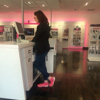 Photo taken at T-Mobile by amita k. on 4/14/2016