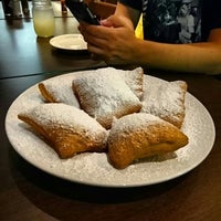 Photo taken at Crescent City Beignets by Pedro M. on 9/28/2015