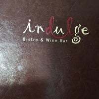 Photo taken at Indulge Bistro and Wine Bar by Debbie W. on 12/3/2016