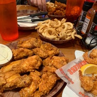 Photo taken at Hooters by M T. on 12/27/2019