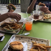 Photo taken at BurgerFi by Jonny B. on 7/27/2018