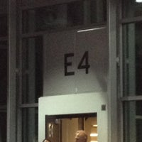 Photo taken at Gate E4 by Ashlie B. on 12/26/2012