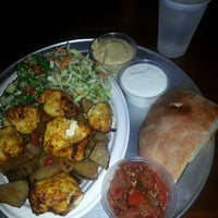 Photo taken at niu armenian grill by Emily D. on 10/31/2012