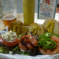 Photo taken at Woody&amp;#39;s Burgers &amp;amp; Beer by Rafael E. on 2/3/2013