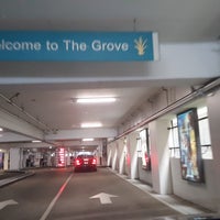 Photo taken at The Grove Parking Garage by Alice K. on 8/3/2018